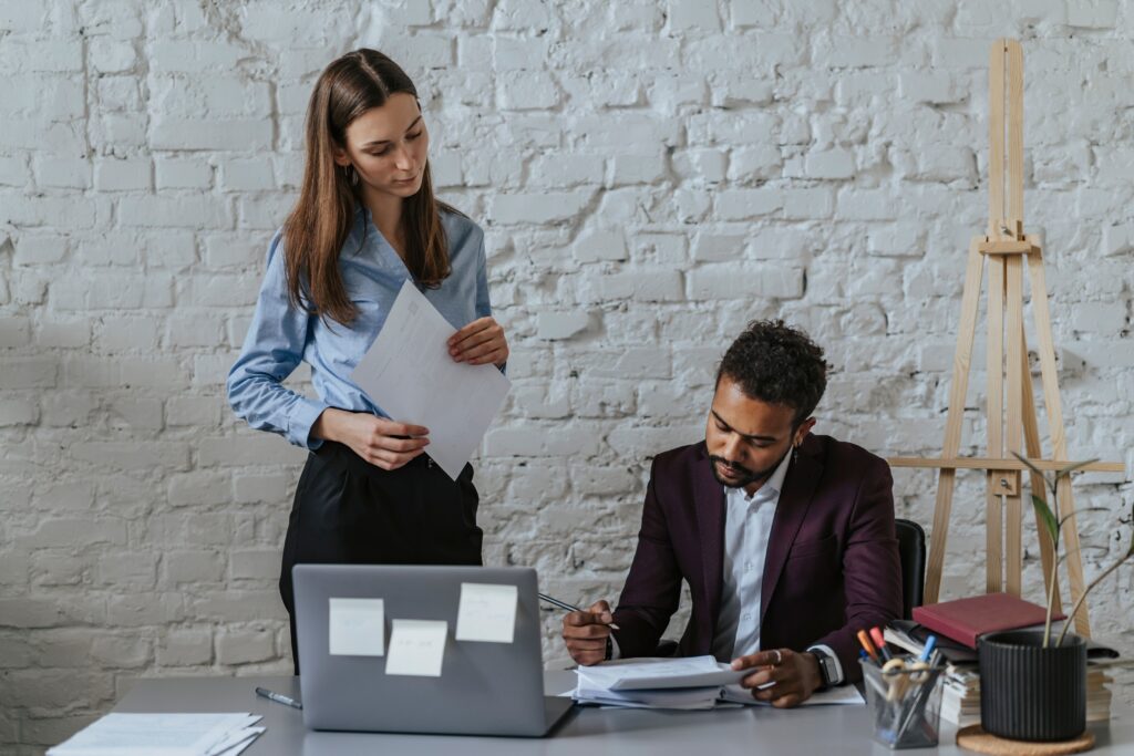 Two people working.